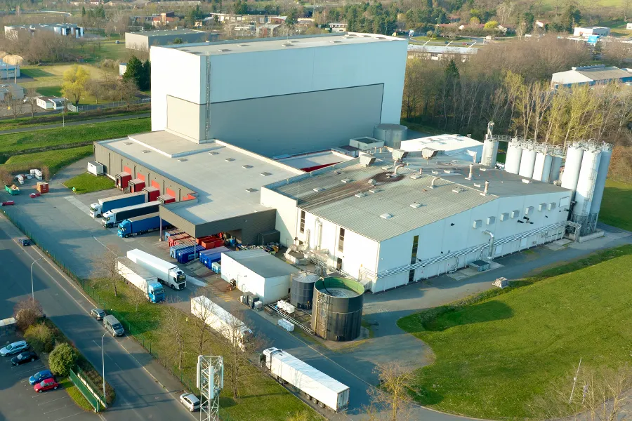 An aerial view of new factory building, designed for the production and shipping of industrial equipment.